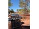 Wooden deck featuring an outdoor kitchen with built in stainless steel grill and view of natural landscape at 571 Oak Vista Ct, Lawrenceville, GA 30044