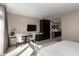 Modern bedroom with a work area, TV, and ensuite kitchenette at 3325 Piedmont Ne Rd # 2407, Atlanta, GA 30305