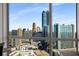 Expansive city views from floor to ceiling windows showing many other buildings at 3325 Piedmont Ne Rd # 2407, Atlanta, GA 30305