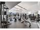 Well-equipped gym featuring modern fitness equipment and large windows at 3325 Piedmont Ne Rd # 2407, Atlanta, GA 30305