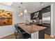 Modern kitchen featuring granite countertops, stainless steel appliances, and barstool seating at 3325 Piedmont Ne Rd # 2407, Atlanta, GA 30305