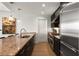 Modern kitchen with stainless steel appliances, granite countertops, and recessed lighting at 3325 Piedmont Ne Rd # 2407, Atlanta, GA 30305