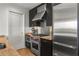 Gourmet kitchen with stainless steel appliances and professional-grade cooktop at 3325 Piedmont Ne Rd # 2407, Atlanta, GA 30305