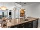 Stylish kitchen with granite counters, stainless appliances, and view to living space at 3325 Piedmont Ne Rd # 2407, Atlanta, GA 30305