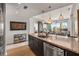 Modern kitchen featuring granite countertops, stainless steel appliances, and an open layout with city views at 3325 Piedmont Ne Rd # 2407, Atlanta, GA 30305