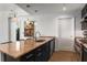 Contemporary kitchen featuring granite countertops, stainless steel appliances, and modern lighting at 3325 Piedmont Ne Rd # 2407, Atlanta, GA 30305