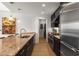 Convenient laundry area with stacked washer and dryer and storage solutions at 3325 Piedmont Ne Rd # 2407, Atlanta, GA 30305