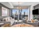 Cozy living room with modern decor, comfortable seating, city view, and stylish lighting at 3325 Piedmont Ne Rd # 2407, Atlanta, GA 30305