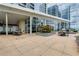 Expansive rooftop terrace with dining areas, BBQ, and city views at 3325 Piedmont Ne Rd # 2407, Atlanta, GA 30305