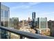 Panoramic city view from balcony featuring contemporary high-rise buildings in the skyline at 3325 Piedmont Ne Rd # 2407, Atlanta, GA 30305