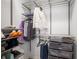 Bright, tidy walk-in closet with ample metal shelving and clothing racks for optimal storage at 3325 Piedmont Ne Rd # 2407, Atlanta, GA 30305