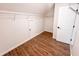 Walk-in closet with wood flooring and shelving at 3405 Summer Brooke Way, Union City, GA 30291