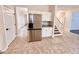 Updated kitchen with white cabinets and stainless steel appliances at 3405 Summer Brooke Way, Union City, GA 30291