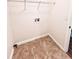 Laundry room with tile floor and overhead shelving at 3405 Summer Brooke Way, Union City, GA 30291