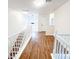 Spacious upstairs hallway with wood floors at 3405 Summer Brooke Way, Union City, GA 30291