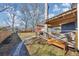 Backyard featuring a wooden deck with a pergola and a grassy area at 2507 Maple St, Atlanta, GA 30344