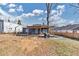 Backyard with a wooden deck, pergola, and a grill at 2507 Maple St, Atlanta, GA 30344