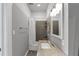 Renovated bathroom with gray subway tile in the shower and a sleek vanity sink at 2507 Maple St, Atlanta, GA 30344