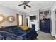 Bright bedroom with hardwood floors, a plush bed, and ample natural light for a relaxing retreat at 2507 Maple St, Atlanta, GA 30344