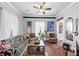 Stylish living room with hardwood floors, ample seating, and bright decor, perfect for gatherings at 2507 Maple St, Atlanta, GA 30344