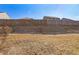 Fenced backyard with sloped terrain needs landscaping at 4160 Alveston Dr, Atlanta, GA 30349