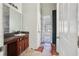 Bathroom with vanity, sink and under-counter storage.Needs renovation at 4160 Alveston Dr, Atlanta, GA 30349
