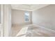 Simple bedroom with a window and wood floors at 4160 Alveston Dr, Atlanta, GA 30349