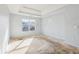 Simple bedroom with window and wood flooring at 4160 Alveston Dr, Atlanta, GA 30349