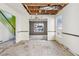 Dining room with exposed ceiling beams and chandelier at 4160 Alveston Dr, Atlanta, GA 30349