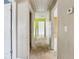 Upper hallway with doors to bedrooms and exposed subflooring at 4160 Alveston Dr, Atlanta, GA 30349
