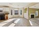 Kitchen with tile floor, view into living room and fireplace at 4160 Alveston Dr, Atlanta, GA 30349