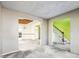 View of a living room and staircase, needing renovation at 4160 Alveston Dr, Atlanta, GA 30349