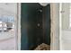 Shower stall with dark green surround needs renovation at 4160 Alveston Dr, Atlanta, GA 30349