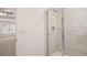 This bathroom offers a tile shower, and access to the bedroom through a door at 13520 Whitman Lane, Covington, GA 30014