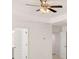 Bright bedroom with a ceiling fan and access to other rooms in neutral tones at 13520 Whitman Lane, Covington, GA 30014