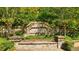 Beautiful stone monument sign marking the entrance to the Wildwood community at 13520 Whitman Lane, Covington, GA 30014