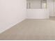 This loft features neutral carpeting and overlooks a bright living room at 13520 Whitman Lane, Covington, GA 30014