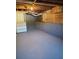 Partially finished basement offering extra storage and shelving at 1800 Pinedale Nw Dr, Atlanta, GA 30314
