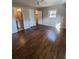 Bright bedroom featuring hardwood floors and an ensuite bathroom at 1800 Pinedale Nw Dr, Atlanta, GA 30314