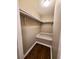 Spacious closet with built-in shelving and a bench at 1800 Pinedale Nw Dr, Atlanta, GA 30314