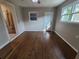 Spacious dining area featuring hardwood floors and access to back patio at 1800 Pinedale Nw Dr, Atlanta, GA 30314