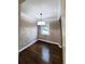 Formal dining room with dark hardwood floors and a modern light fixture at 1800 Pinedale Nw Dr, Atlanta, GA 30314