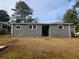 Gray painted brick house with new windows and landscaping at 1800 Pinedale Nw Dr, Atlanta, GA 30314