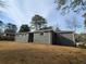 Newly painted gray exterior with a well-maintained yard at 1800 Pinedale Nw Dr, Atlanta, GA 30314