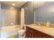 Clean bathroom with tub, shower, and granite vanity at 361 17Th St # 2001, Atlanta, GA 30363