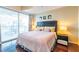 Spacious bedroom with a king-size bed and city view at 361 17Th St # 2001, Atlanta, GA 30363