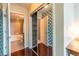 Bedroom with mirrored closet and en-suite bathroom at 361 17Th St # 2001, Atlanta, GA 30363