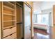 Spacious bedroom closet with built-in shelves and drawers at 361 17Th St # 2001, Atlanta, GA 30363