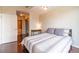 Bedroom with queen bed, hardwood floors, and city view at 361 17Th St # 2001, Atlanta, GA 30363