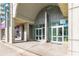 Modern building entrance with glass doors and arched entryway at 361 17Th St # 2001, Atlanta, GA 30363